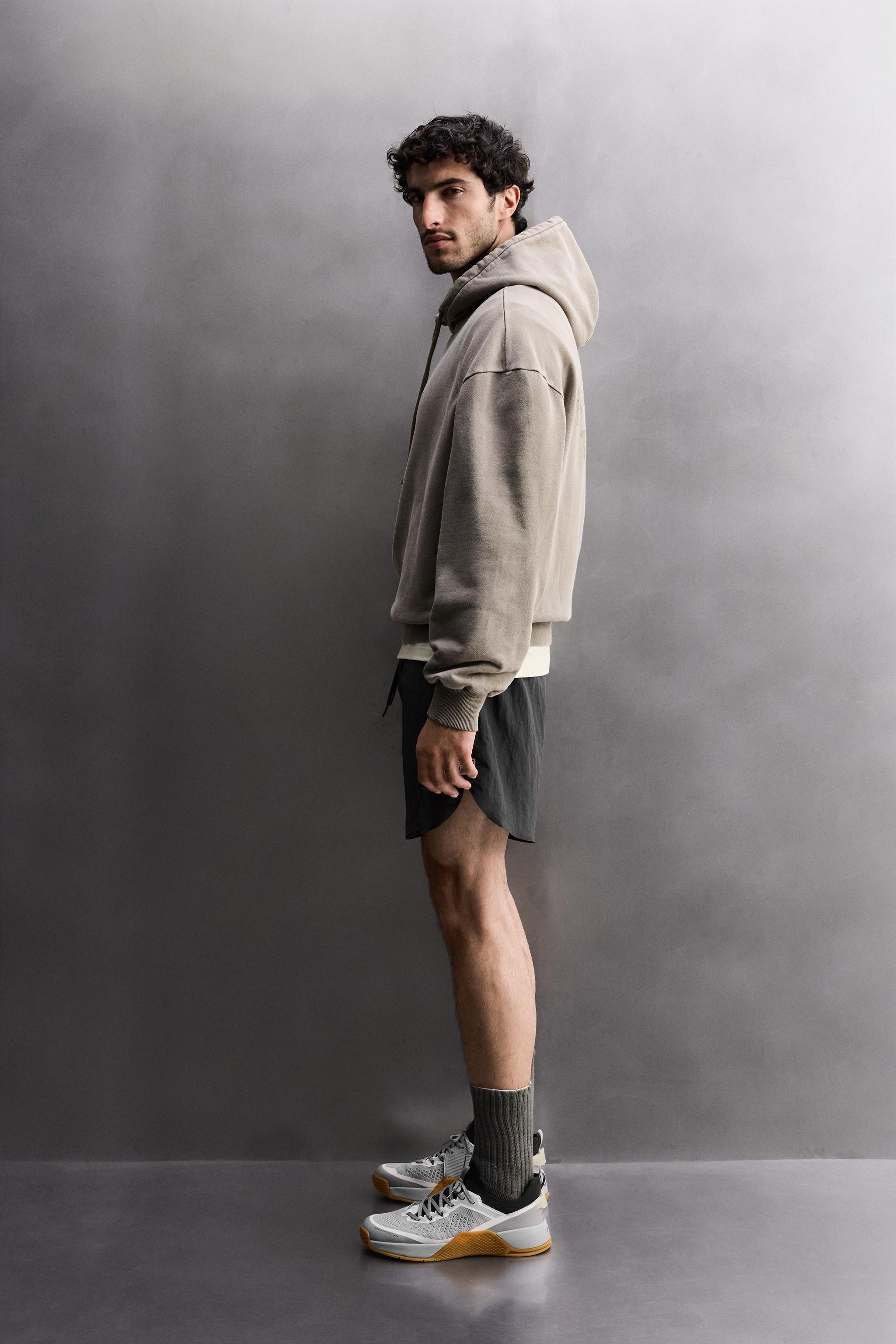 WASHED RELAXED FIT TRAINING SWEATSHIRT